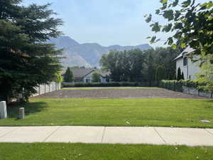 View of yard with a mountain view