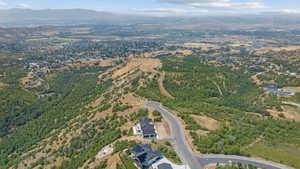 Aerial view of property's location with mountains