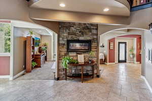 Entrance foyer featuring baseboards and recessed lighting