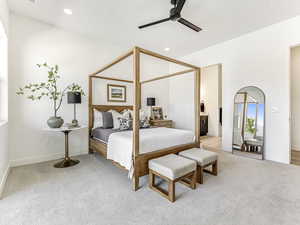 Bedroom featuring light colored carpet, recessed lighting, ceiling fan, and ensuite bathroom