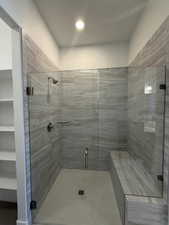 Full bathroom featuring a stall shower