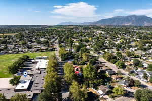 View of property location with nearby suburban area and mountains.