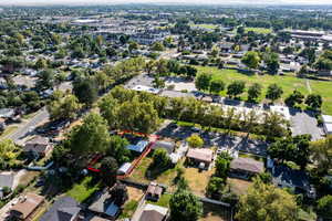 Aerial view of residential area with property boundaries highlighted.