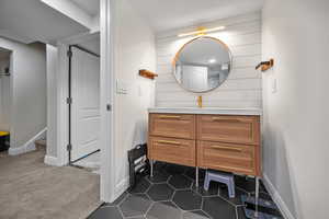 Downstairs Bathroom with contemporary vanity.