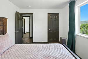 Bedroom with baseboards