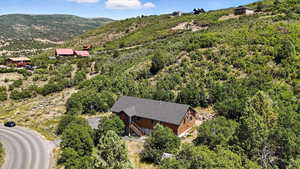 View of subject property with a mountainous background