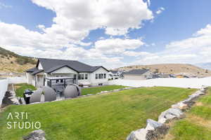 Fenced backyard with a residential view