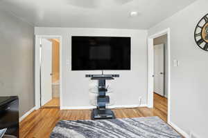 Living area with wood finished floors