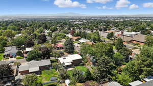 Aerial perspective of suburban area featuring mountains