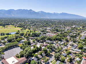Aerial view of residential area with a water and mountain view
