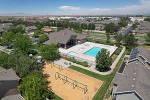 Aerial view of residential area featuring a pool