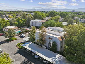 Aerial view of residential area featuring a mountain backdrop