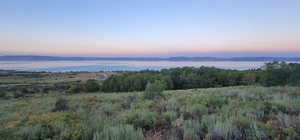 Mountain view featuring a nearby body of water