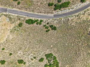 Aerial overview of property's location featuring rural landscape and a desert landscape