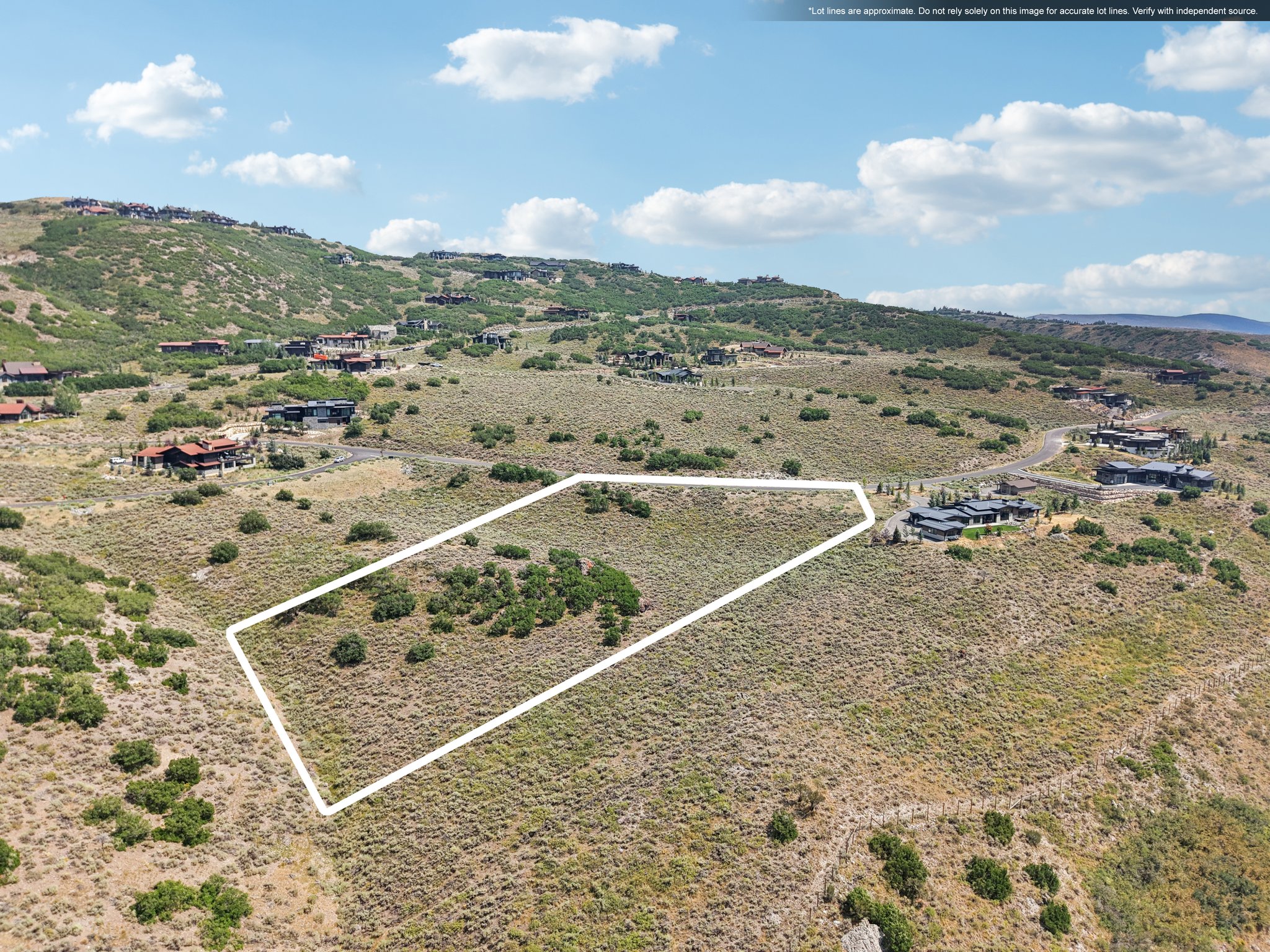 View of rural area featuring property boundaries highlighted and a mountainous background