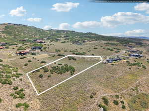 View of rural area featuring property boundaries highlighted and a mountainous background
