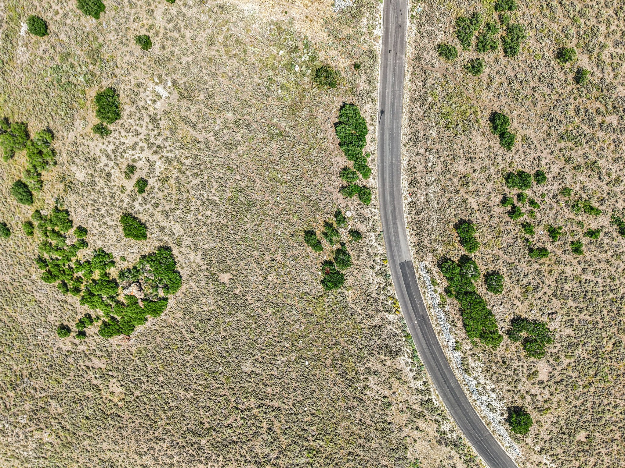 Aerial view of property and surrounding area with rural landscape and a desert landscape