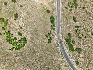Aerial view of property and surrounding area with rural landscape and a desert landscape