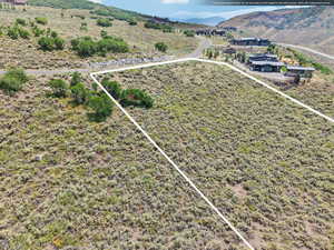 View of property location featuring property boundaries highlighted and a mountain backdrop