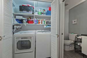 Laundry room featuring washing machine and dryer