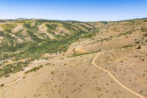 View of property location with rural landscape and a mountain backdrop