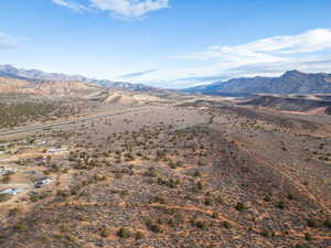 View of mountain backdrop featuring rural landscape