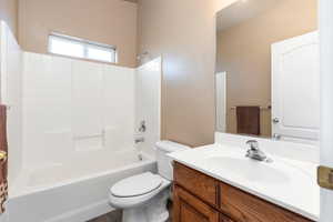 Full bathroom with vanity and shower / tub combination