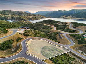 View of property location with a water and mountain view and property boundaries highlighted