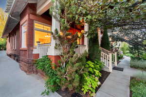 View of property exterior with brick siding