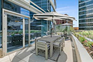 View of patio with outdoor dining area