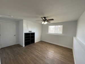 Primary bedroom 4 featuring wood finished floors and ceiling fan