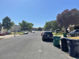 View of neighborhood to the west with a residential view, sidewalks, and curbs