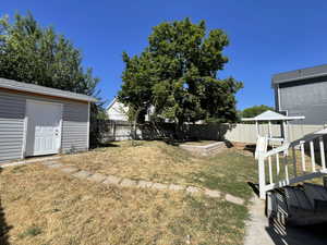 Fenced backyard with shed/workshop