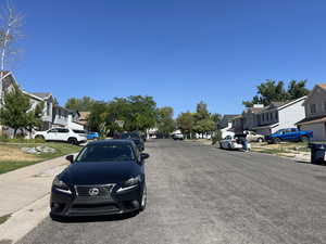 View of neighborhood to the east with a residential view, sidewalks, and curbs