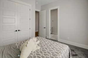 Bedroom with baseboards and a closet