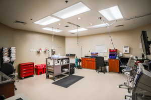 Office space featuring finished concrete floors