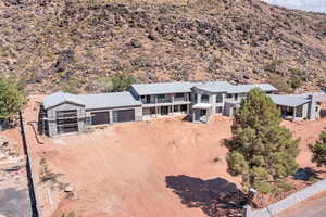View of subject property with mountains
