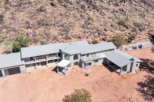 View of subject property featuring a desert landscape