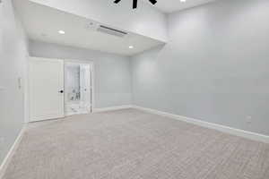 Empty room with light carpet, recessed lighting, and a ceiling fan