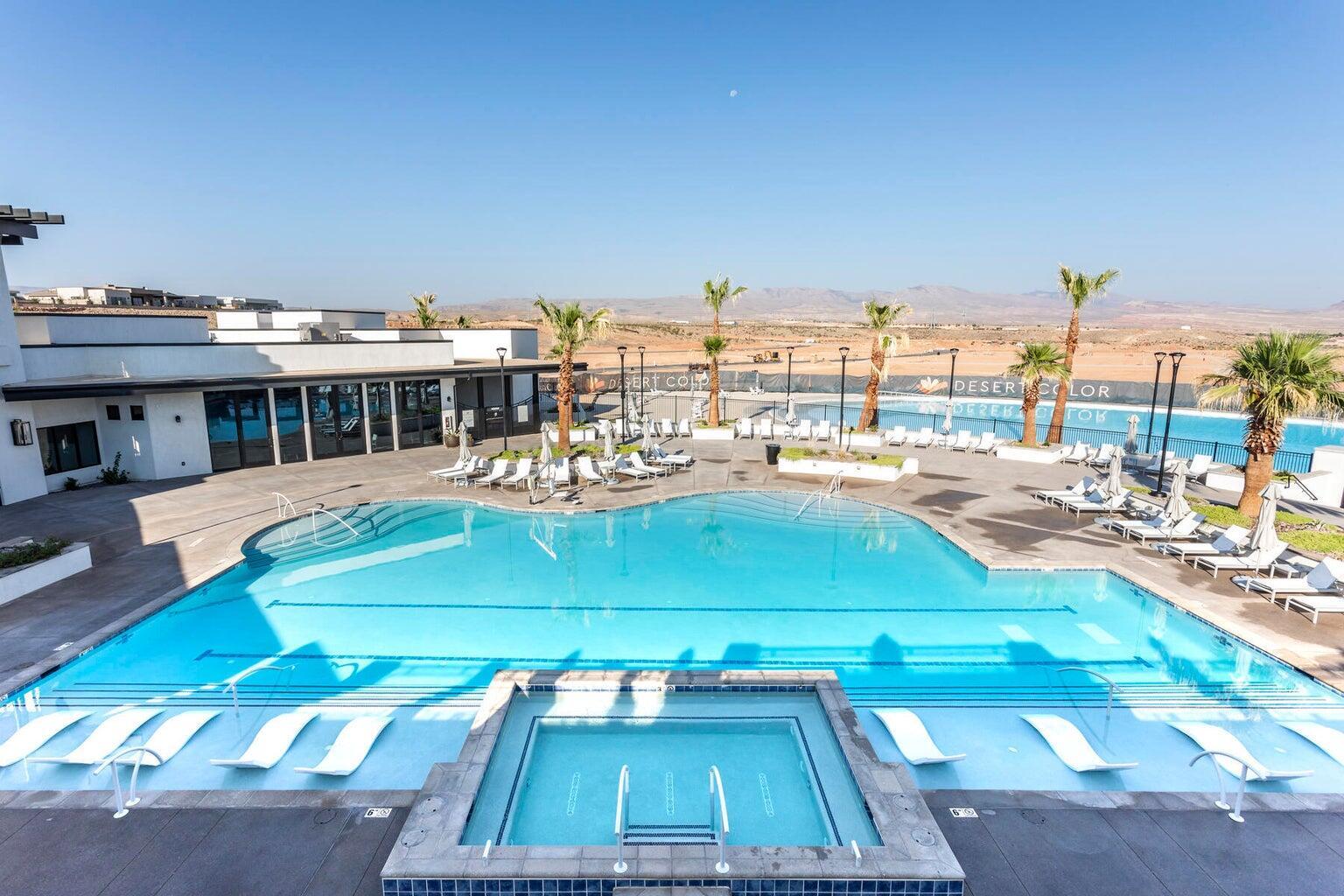 Community pool featuring a patio and a mountain view