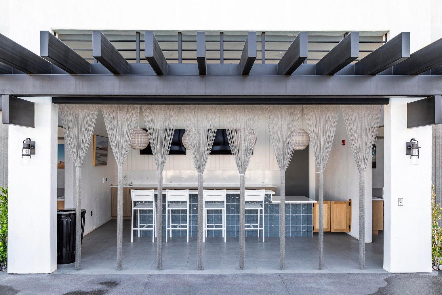 View of patio / terrace with an outdoor bar