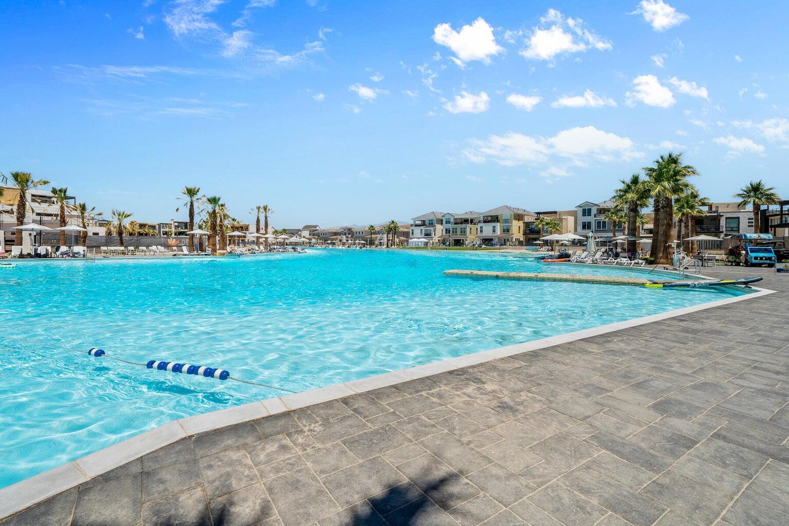 Community pool featuring a residential view