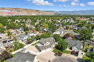Aerial view of residential area featuring mountains