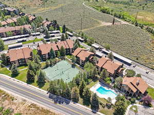Aerial overview of property's location featuring nearby suburban area
