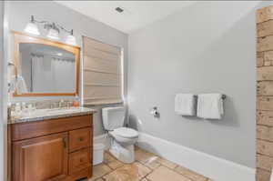 Bathroom featuring vanity and a shower with curtain