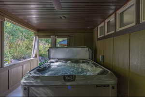 Wooden deck with a hot tub