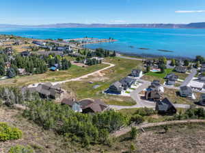 Aerial view of residential area with a water and mountain view