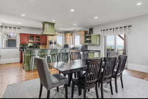 Dining room featuring recessed lighting and light wood-style flooring