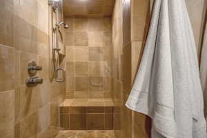 Full bath with tiled shower