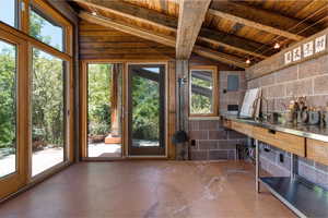 Artist studio, formerly the "garden shed" with work area, sink and awning.